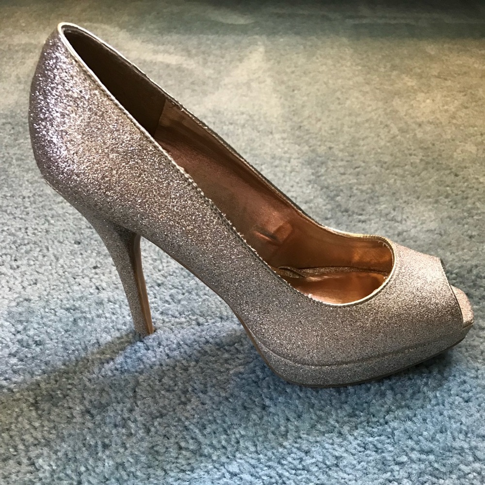 Steve Madden women’s platform sparkle heels.